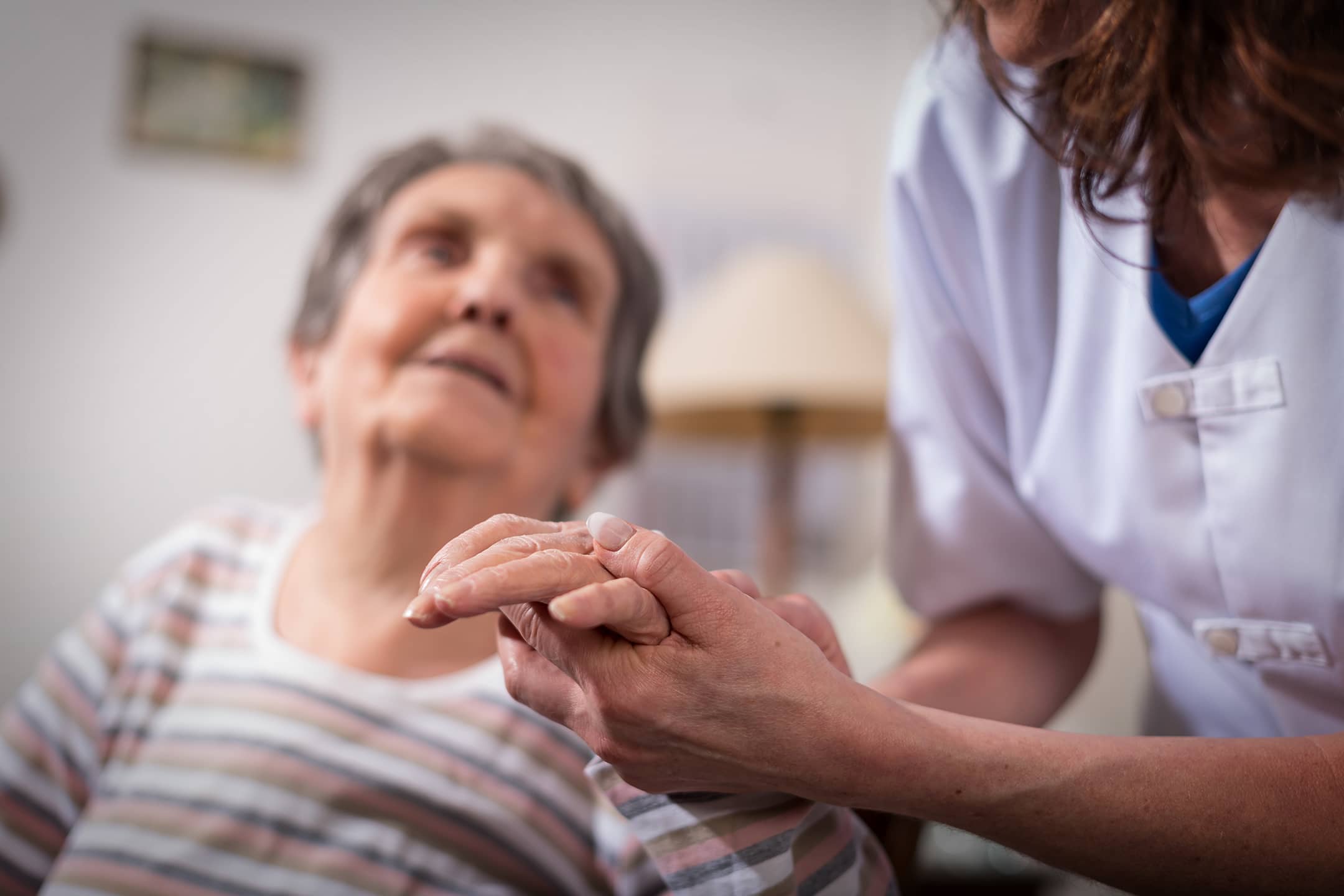 Curae case image of nurse with patient