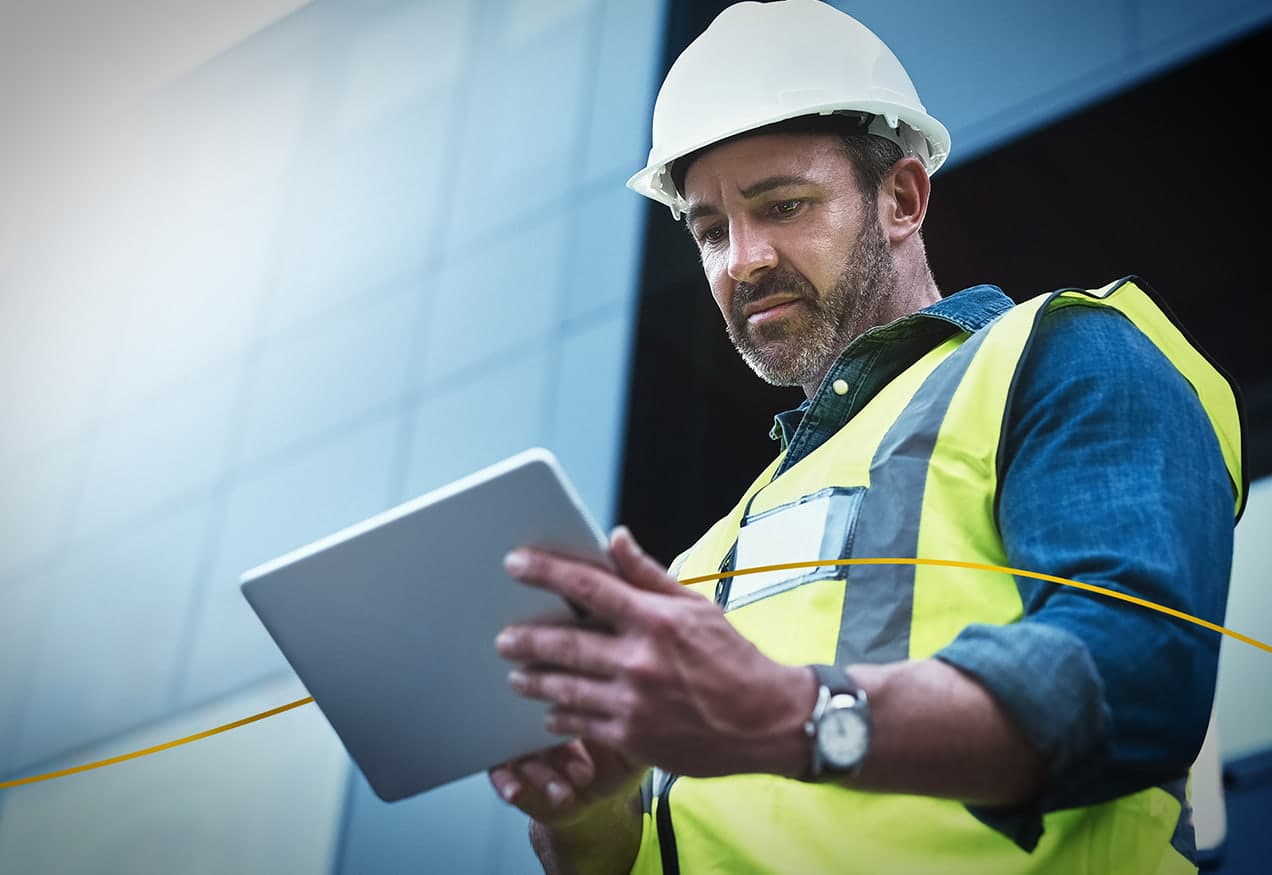 a man esign a document on a tablet